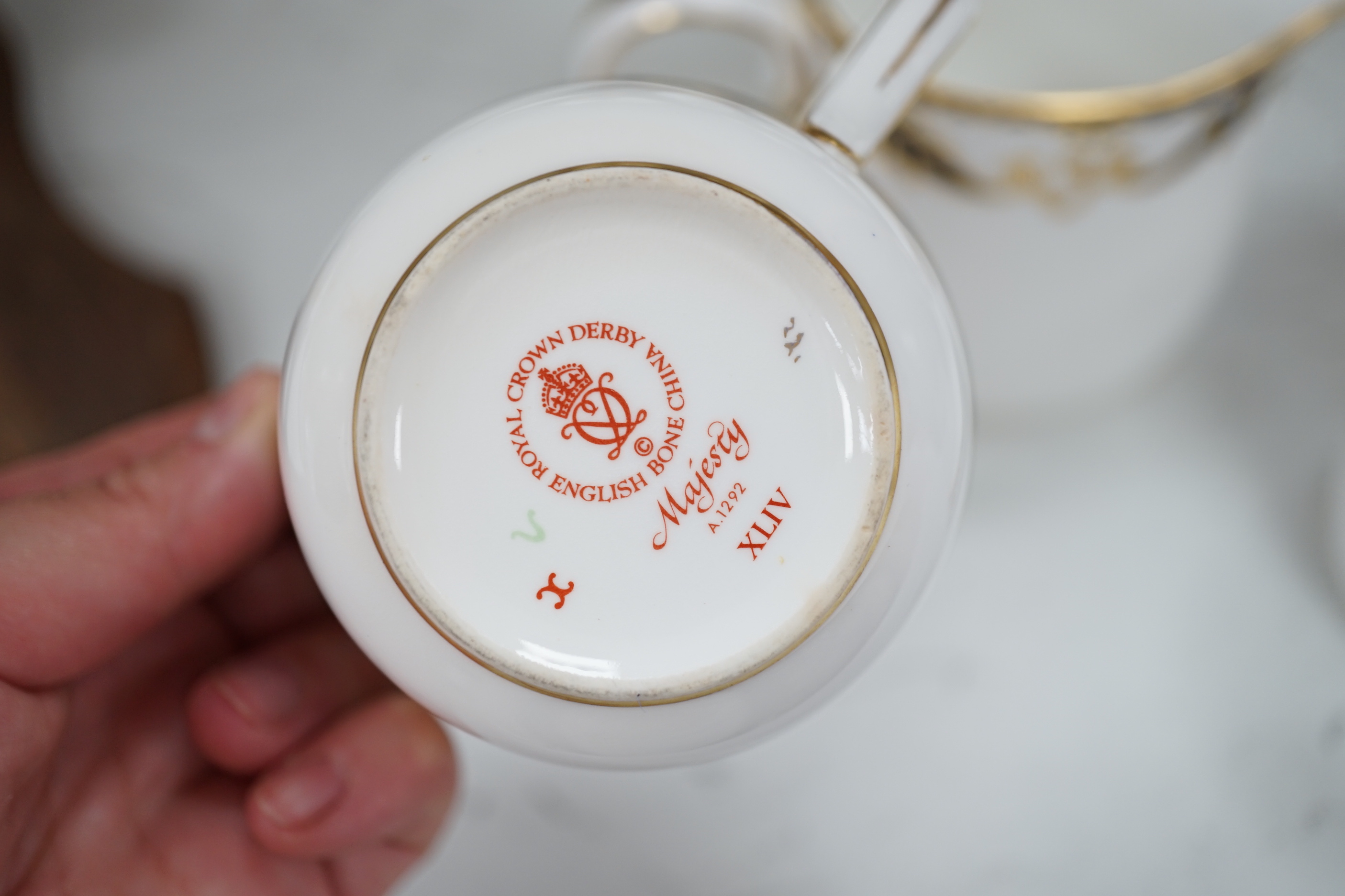 A Royal Crown Derby Majesty pattern service, largest 26cm wide